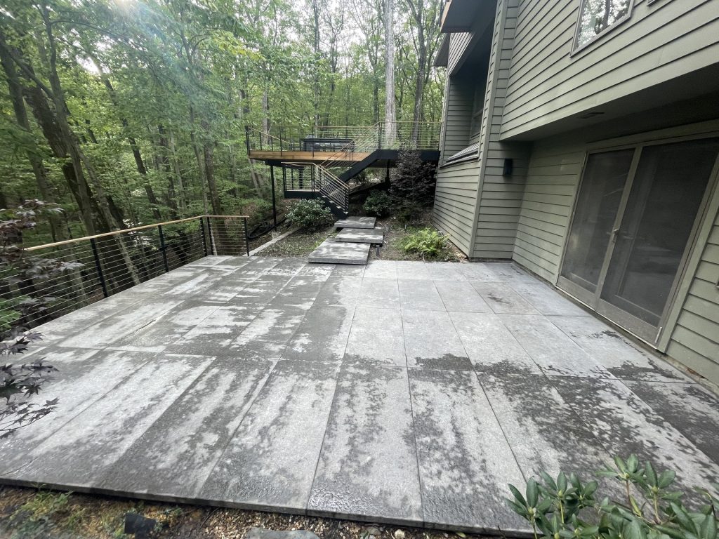 Large paver patio construction project by Dutchess Lawns & Masonry