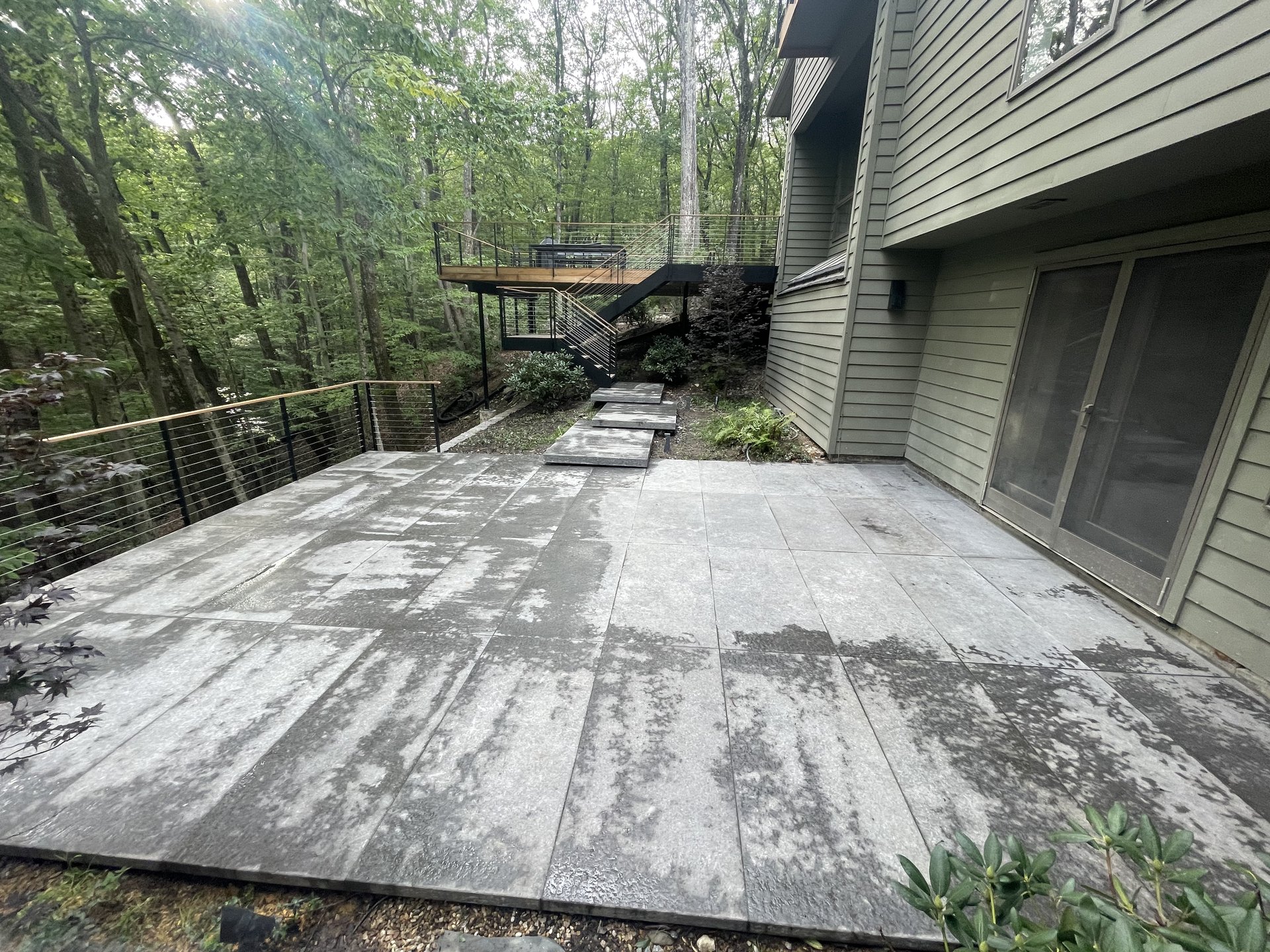 Large paver patio construction project by Dutchess Lawns & Masonry