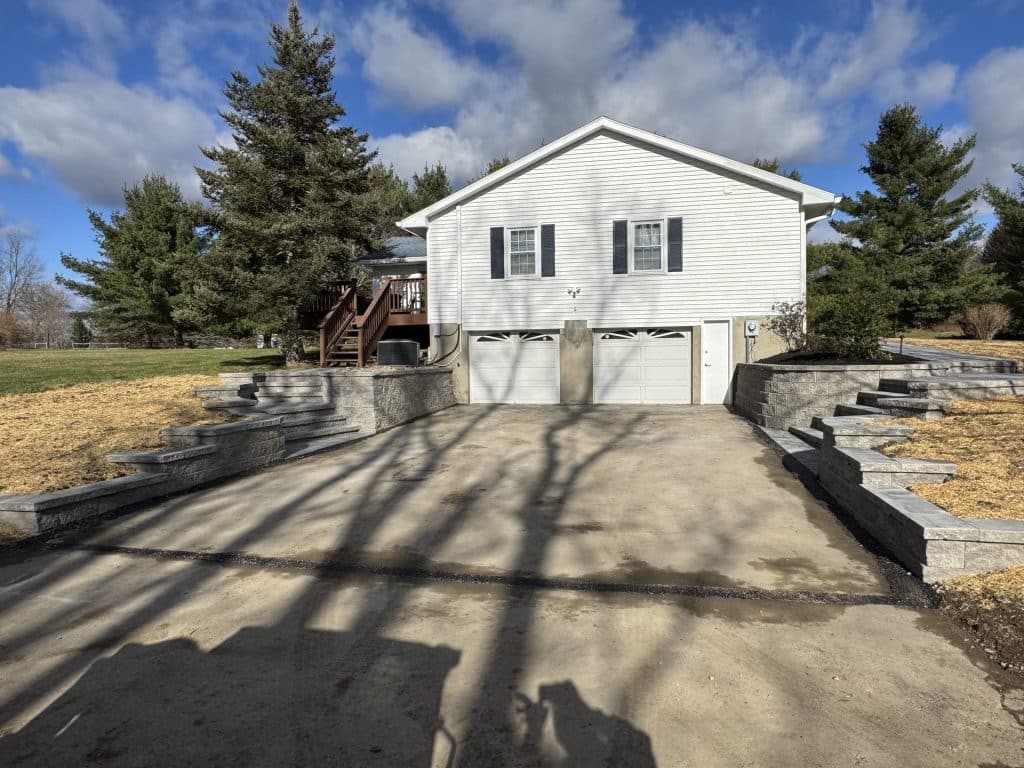 Front yard grading and driveway preparation in spring